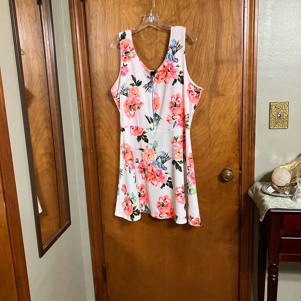 Woman vibrant color mini dress with floral print